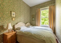 Two single beds in the Phlox bedroom
